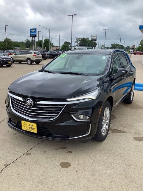 2023 Buick Enclave Essence in Ebony Twilight Metallic — front three-quarter view